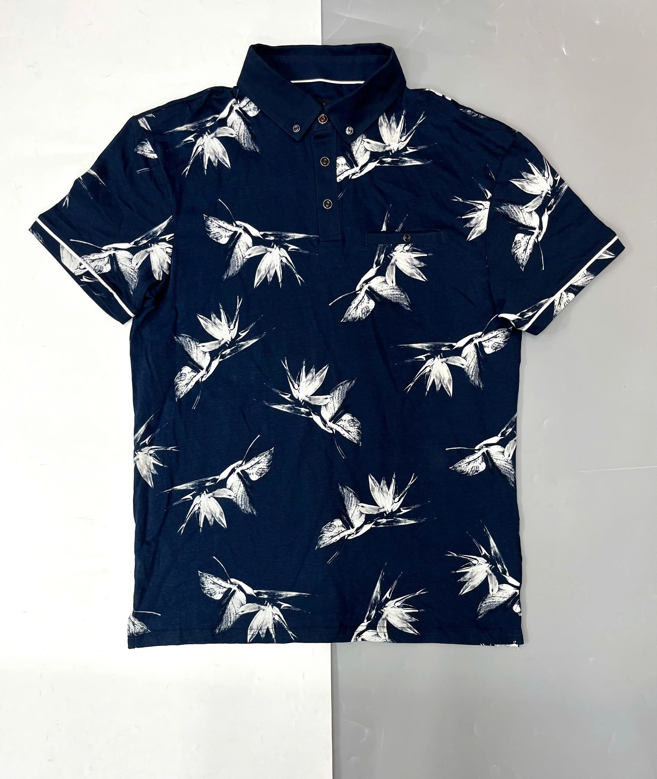 ÁO POLO HOẠ TIẾT CON CÒ TRẮNG XANH CONNOR