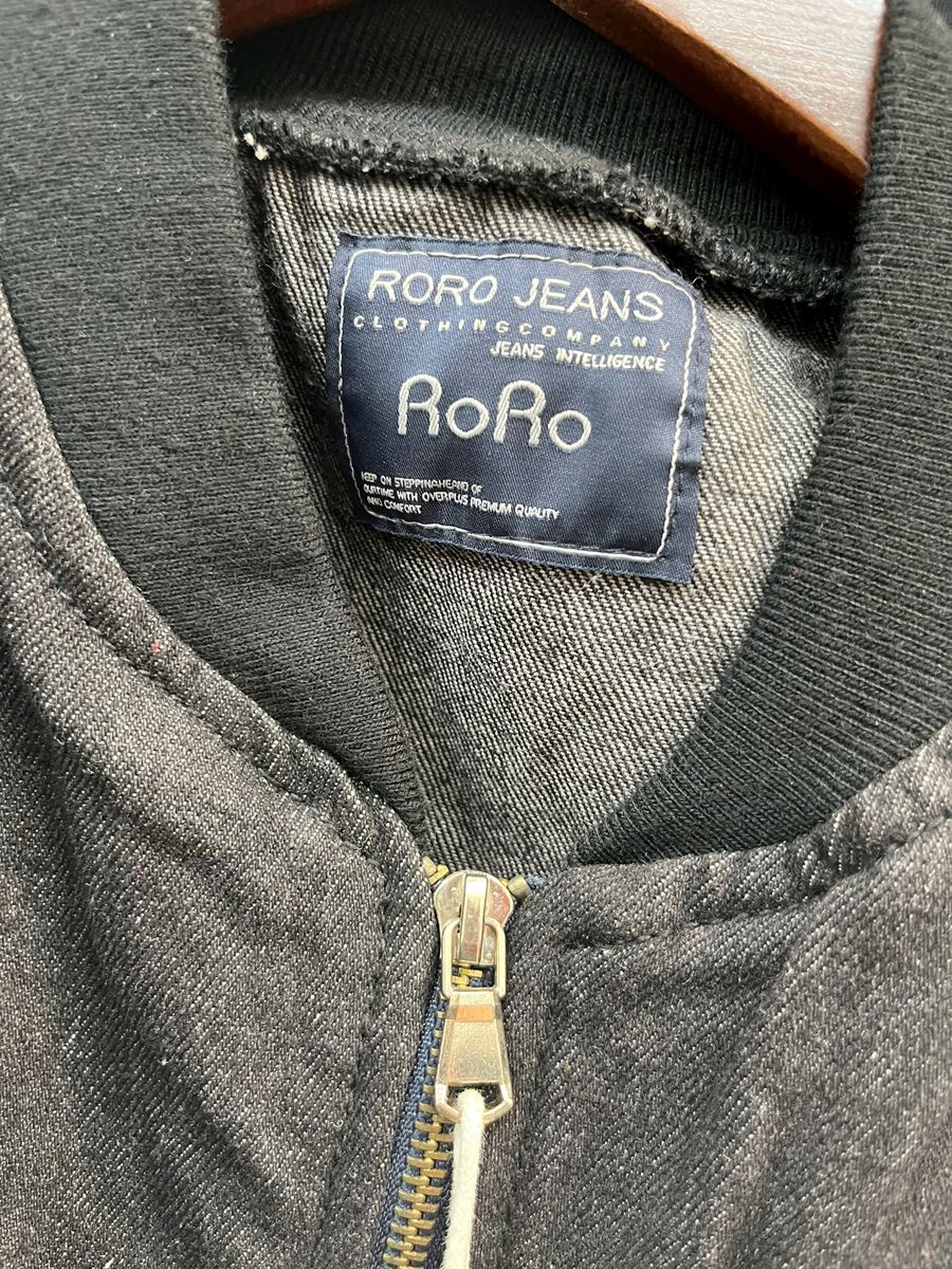 ÁO KHOÁC JEANS RORO TAY PHỐI MỘT BÊN